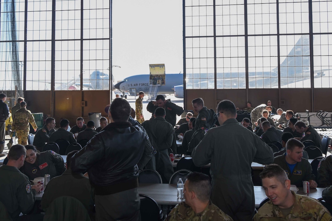 Students in Undergraduate Pilot Training engage with one another and share training experiences during the Air Education and Training Command Fly-In Nov. 15, 2019, at McConnell Air Force Base, Kan. The students attending the AETC Fly-In came from student squadrons at Vance Air Force Base, Oklahoma, Laughlin Air Force Base, Texas, and Columbus Air Force Base, South Carolina. (U.S. Air Force photo by Airman 1st Class Alexi Bosarge)