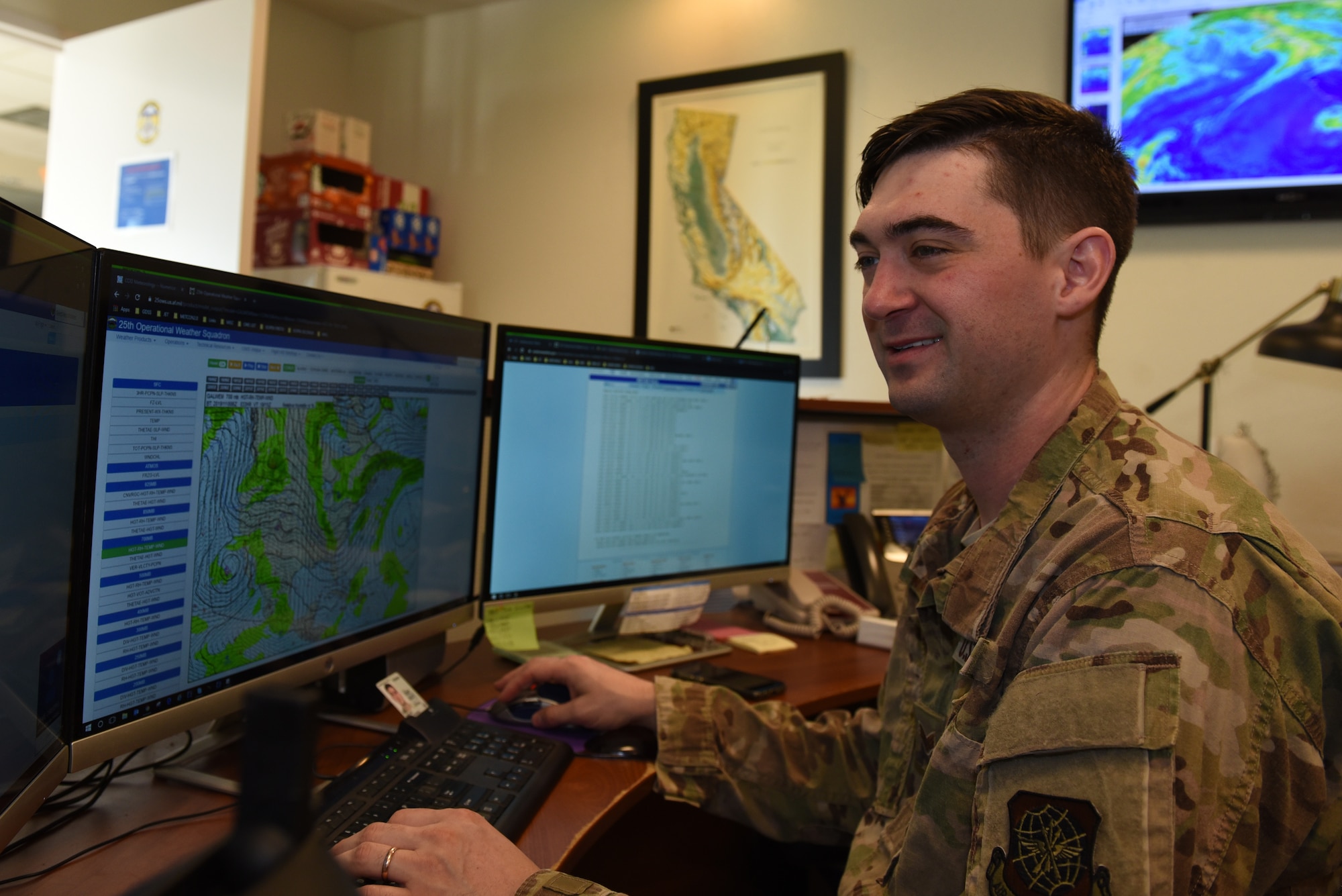 U.S. Air Force Senior Airman Dylan Marler, 60th Operation Support Squadron weather forecaster, checks the weather patterns of California Nov. 18, 2019, at Travis Air Force Base California. Marler is tasked with keeping track of the weather that will effect Travis AFB and its flying mission.  (U.S. Air Force photo by Airman 1st Class Cameron Otte)