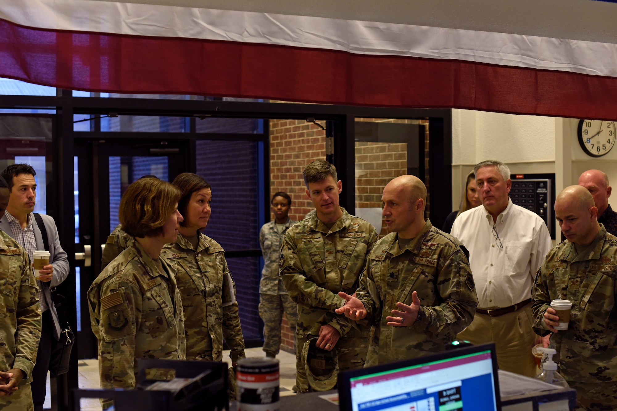 U.S. Air Force Lt. Col. Christopher Sharp, 316th Training Squadron commander, briefs Maj. Gen. Andrea Tullos, 2nd Air Force commander, about the student housing status during her tour of Goodfellow Air Force Base, Texas, Nov. 21, 2019. During her tour of the dormitory, Tullos was shown renovations being made to increase the Airmen’s quality of life. (U.S. Air Force photo by Airman 1st Class Zachary Chapman/Released)