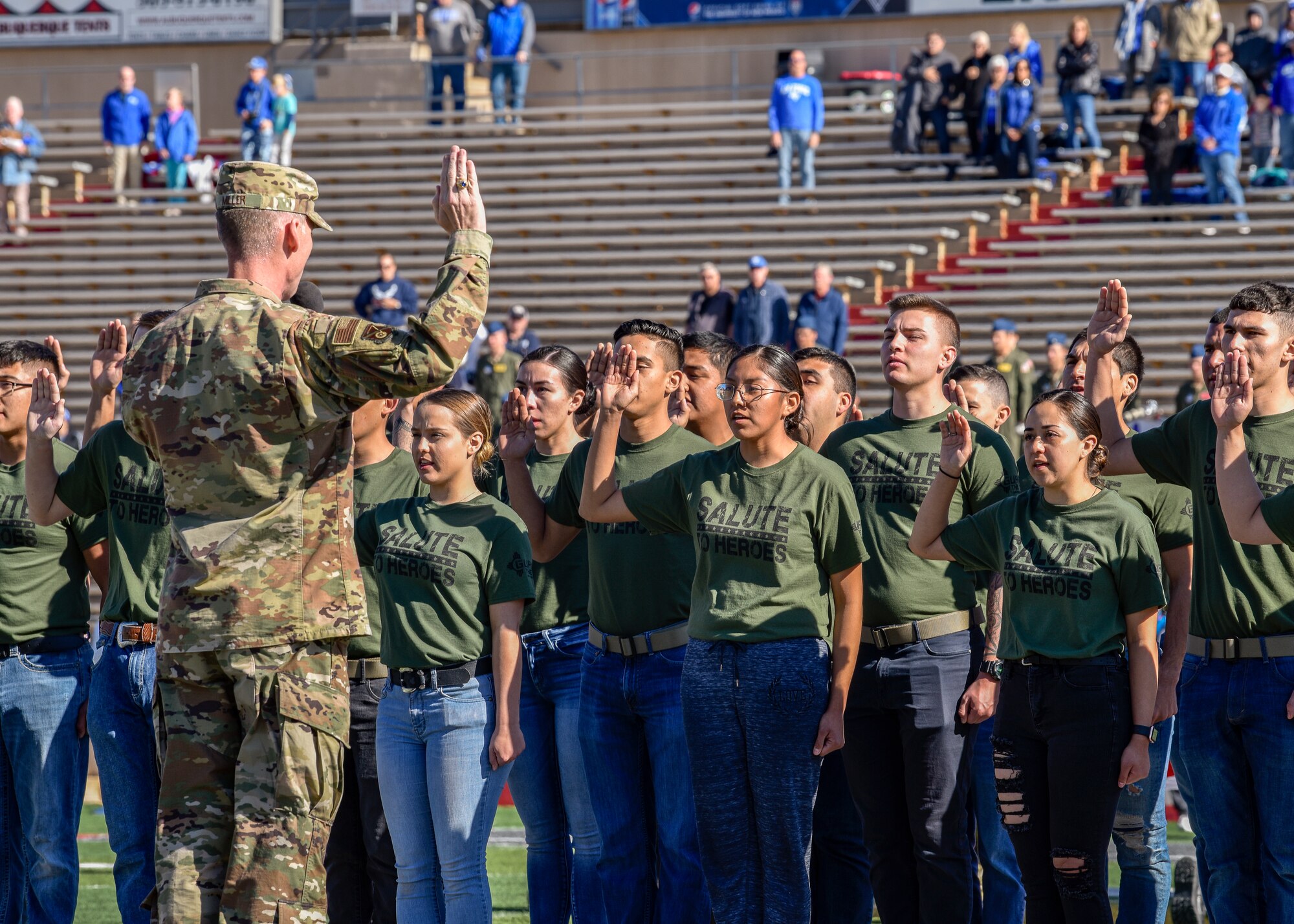 Military recruits take the Oath of Enlistment.