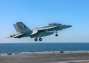 An F/A-18F Super Hornet attached to the "Jolly Rogers" of Strike Fighter Squadron (VFA) 103 launches from the flight deck of the aircraft carrier USS Abraham Lincoln (CVN 72). Abraham Lincoln Carrier Strike Group is deployed to the U.S. 5th Fleet area of operations in support of naval operations to ensure maritime stability and security in the Central Region, connecting the Mediterranean and the Pacific through the western Indian Ocean and three strategic choke points. With Abraham Lincoln as the flagship, deployed strike group assets include staffs, ships and aircraft of Carrier Strike Group 12 (CSG 12), Destroyer Squadron 2 (DESRON 2), USS Leyte Gulf (CG 55) and Carrier Air Wing 7 (CVW 7).