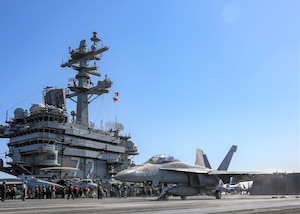 An F/A-18F Super Hornet attached to the "Jolly Rogers" of Strike Fighter Squadron (VFA) 103 launches from the flight deck of the aircraft carrier USS Abraham Lincoln (CVN 72). Abraham Lincoln Carrier Strike Group is deployed to the U.S. 5th Fleet area of operations in support of naval operations to ensure maritime stability and security in the Central Region, connecting the Mediterranean and the Pacific through the western Indian Ocean and three strategic choke points. With Abraham Lincoln as the flagship, deployed strike group assets include staffs, ships and aircraft of Carrier Strike Group 12 (CSG 12), Destroyer Squadron 2 (DESRON 2), USS Leyte Gulf (CG 55) and Carrier Air Wing 7 (CVW 7).