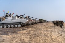U.S. Marines and Indian Soldiers prepare to depart Kakinada, India at the conclusion of exercise Tiger TRIUMPH, Nov. 21, 2019. During Tiger TRIUMPH, U.S. and Indian forces conducted valuable training in humanitarian assistance disaster relief operations by inserting a joint and combined Indian and U.S. force from ship-to-shore in response to a hypothetical natural disaster. While on shore, the forces conducted limited patrolling, moved simulated victims to medical care and produced and distributed drinking water. Military exercises like Tiger TRIUMPH improve partnership, readiness and cooperation. (U.S. Marine Corps photo by 1st Lt. Tori Sharpe)
