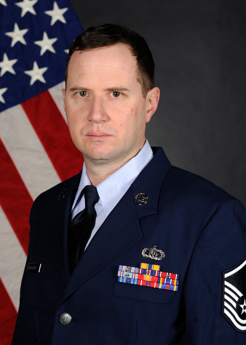 Official photo of Master Sergeant Joshua Holdridge, Bassist with Final Approach and Pacific Showcase in the United States Air Force Band of the Pacific, Yokota Air Base, Japan.