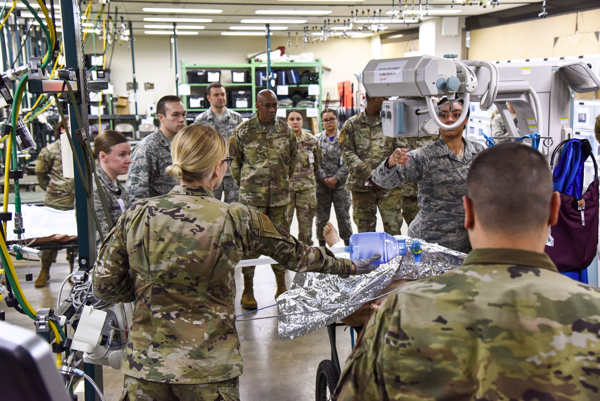 U.S. Air Force Gen. CQ Brown, Jr.,  Pacific Air Forces commander, observes members of the 35th Medical Group performing emergency care on a medical training mannequin during his two-day visit to Misawa Air Base, Japan, Nov. 15, 2019. During the tour, Brown visited various base squadrons and agencies to learn about unit-specific issues and their operations. During his visit, Brown spent two days with Misawa’s Airmen, discussing the vital role they play in maintaining regional security and stability. (U.S. Air Force photo by Staff Sgt. Melanie A. Bulow-Gonterman)