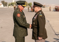 Army Gen. Mark A. Milley, chairman of the Joint Chiefs of Staff, is hosted by Jordanian Air Force Lt. Gen. Yousef al-Hunaiti, chairman of the Joint Chiefs of Staff of the Jordanian Armed Forces, for an Honors Arrival Ceremony in Amman, Jordan, Nov. 24, 2019.