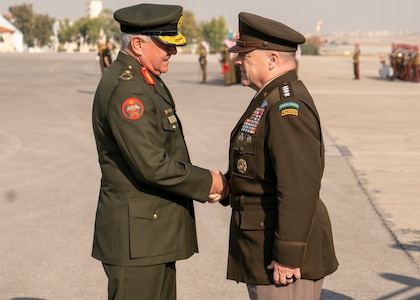 Army Gen. Mark A. Milley, chairman of the Joint Chiefs of Staff, is hosted by Jordanian Air Force Lt. Gen. Yousef al-Hunaiti, chairman of the Joint Chiefs of Staff of the Jordanian Armed Forces, for an Honors Arrival Ceremony in Amman, Jordan, Nov. 24, 2019.