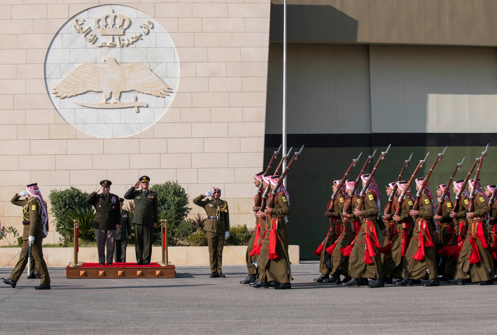 Army Gen. Mark A. Milley, chairman of the Joint Chiefs of Staff, is hosted by Jordanian Air Force Lt. Gen. Yousef al-Hunaiti, chairman of the Joint Chiefs of Staff of the Jordanian Armed Forces, for an Honors Arrival Ceremony in Amman, Jordan, Nov. 24, 2019.