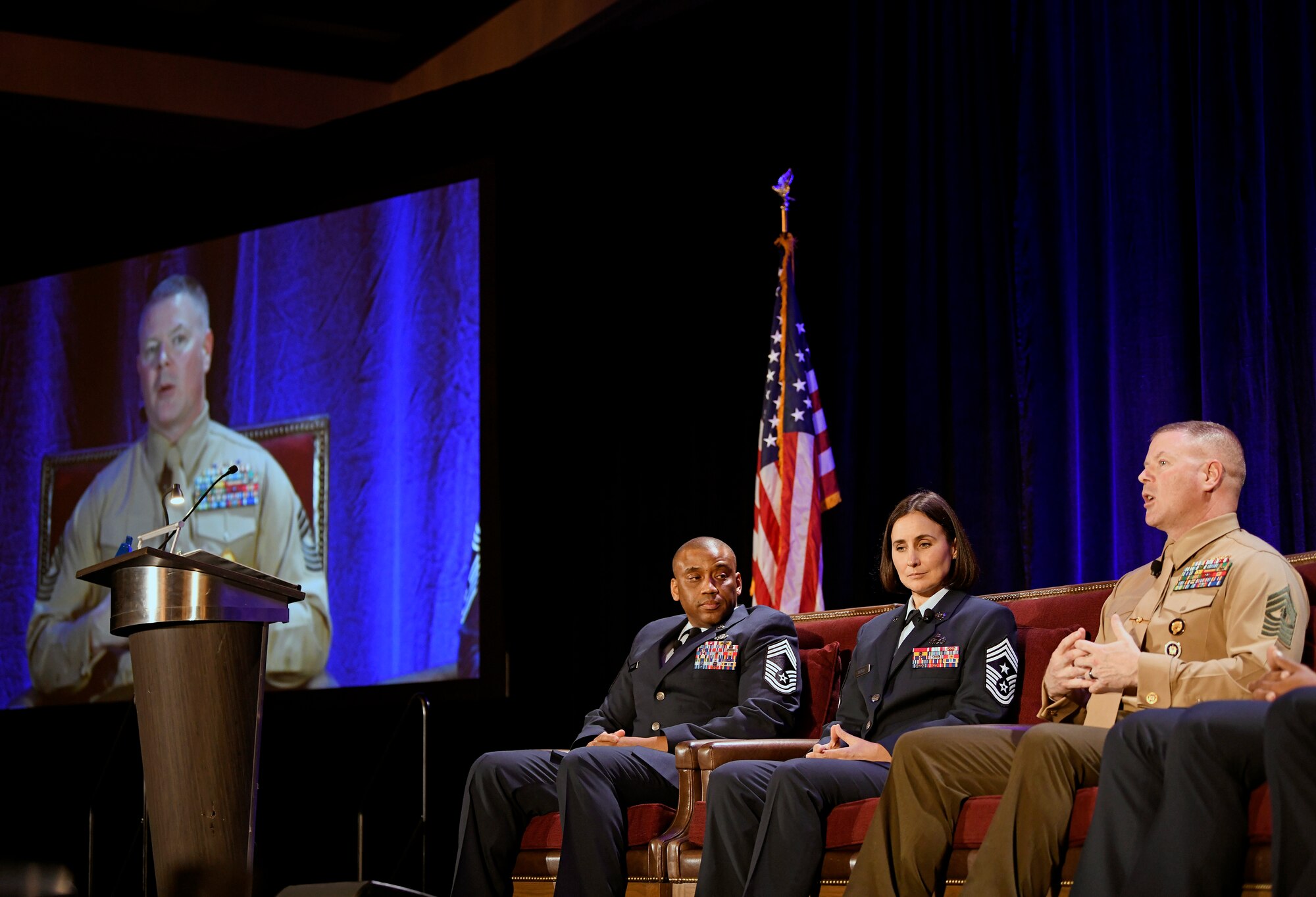 U.S. Marine Corps Master Gunnery Sgt. Scott Stalker, command senior enlisted leader of U.S. Cyber Command (right), speaks to Alamo Armed Forces Communication and Engineering Association Chapter Event attendees in San Antonio, Texas, Nov. 20, 2019, as (left to right) U.S. Air Force Chief Master Sgt. Harold Terrance, Jr., 33rd Network Warfare Squadron superintendent, and U.S. Air Force Chief Master Sgt. Summer Leifer, Sixteenth Air Force command chief, listen in. The three sat on an SEL panel during the annual cyber- and technology-focused conference to discuss cyber enlisted matters. (U.S. Air Force photo by Tech. Sgt. R.J. Biermann)