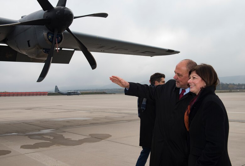 Scott Lockard, left, 86th Airlift Wing vice director, shows Nicole Steingaß, Rheinland-Palatinate state secretary, a C-130J Super Hercules aircraft on Ramstein Air Base, Germany, Nov. 20, 2019. Steingaß coordinates between the Rheinland-Palatinate and the U.S. forces who operate within its borders.