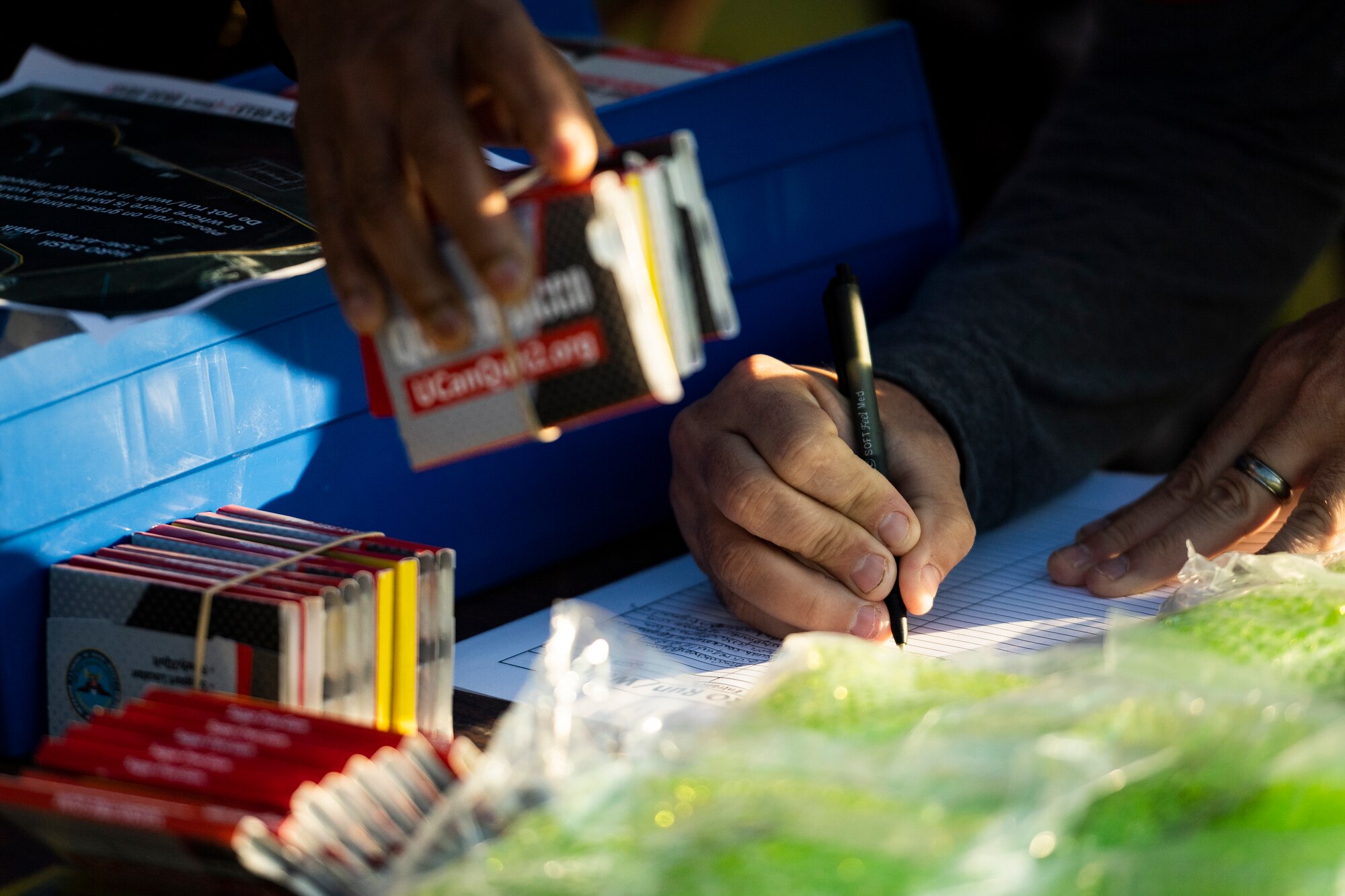A photo of a participant signing up for the Health and Readiness Optimization Dash 4K