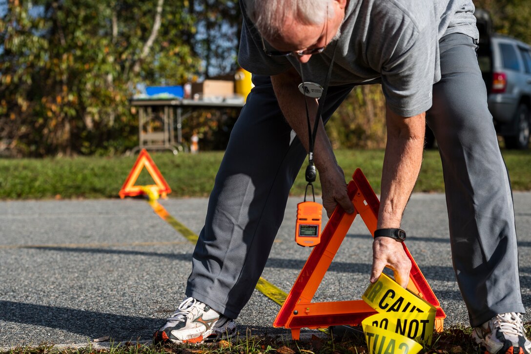 A photo of a Health and Readiness Optimization Dash 4K coordinator marks the finish line
