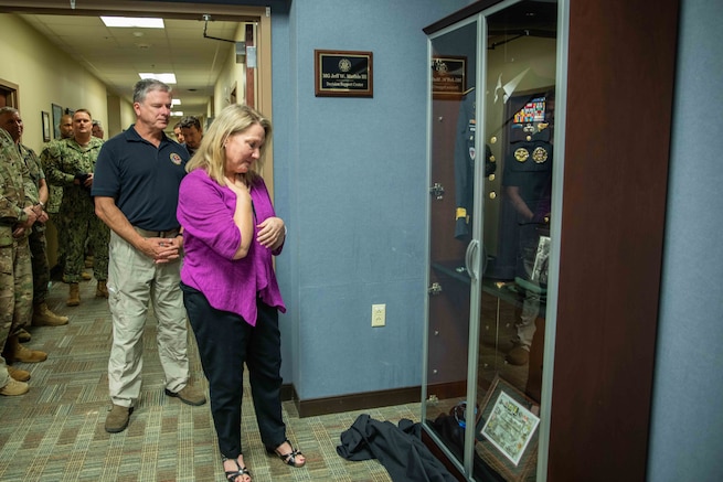 Mrs. Christine Mathis attends a room dedication in place of her late husband U.S. Army Maj. Gen. (ret) Jeff Mathis III, who served as JTF-CS’s commanding general from July 2012 to July 2014. The dedication was held during the command’s 20th anniversary celebration, which also included a Defense Chemical, Biological, Radiological and Nuclear (CBRN) Response Force (DCRF) leadership symposium. The celebration was attended by representatives from U.S. Northern Command (NORTHCOM) and U.S. Army North (ARNORTH), DCRF unit commanders and Federal Emergency Management Agency (FEMA) regional leaders, as well as prior JTF-CS members and alumni. (Official DoD photo by Mass Communication Specialist 3rd Class Michael Redd/RELEASED)