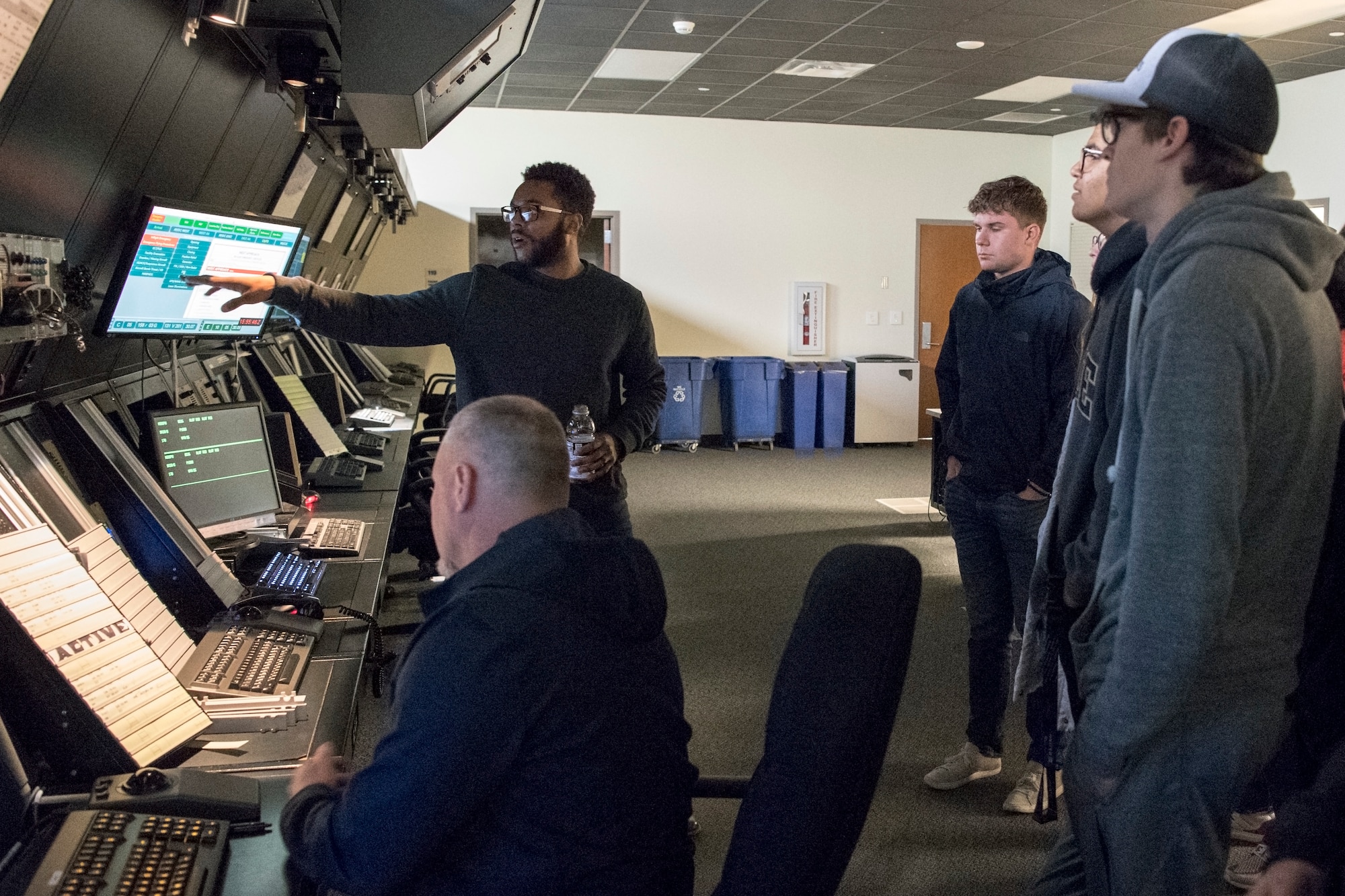 Anthony Morgan, 434th Operations Support Squadron air traffic control specialist, shows students from Purdue University, Indiana, the radar approach control center during a tour at Grissom Air Reserve Base, Ind., Nov. 17, 2019. Grissom ATC manages all commercial, civilian and military air traffic between Chicago and Indianapolis, going as far west as Lafayette, Ind., up to 10,000 feet. (U.S. Air Force photo/Master Sgt. Benjamin Mota)