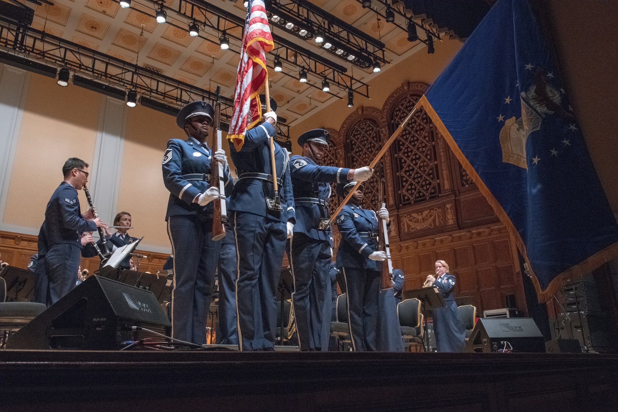 The 910th Airlift Wing base color guard presents the colors during a U.S. Air Force Heritage of America Band concert at Stambaugh Auditorium in Youngstown, Ohio, Nov. 18, 2019.