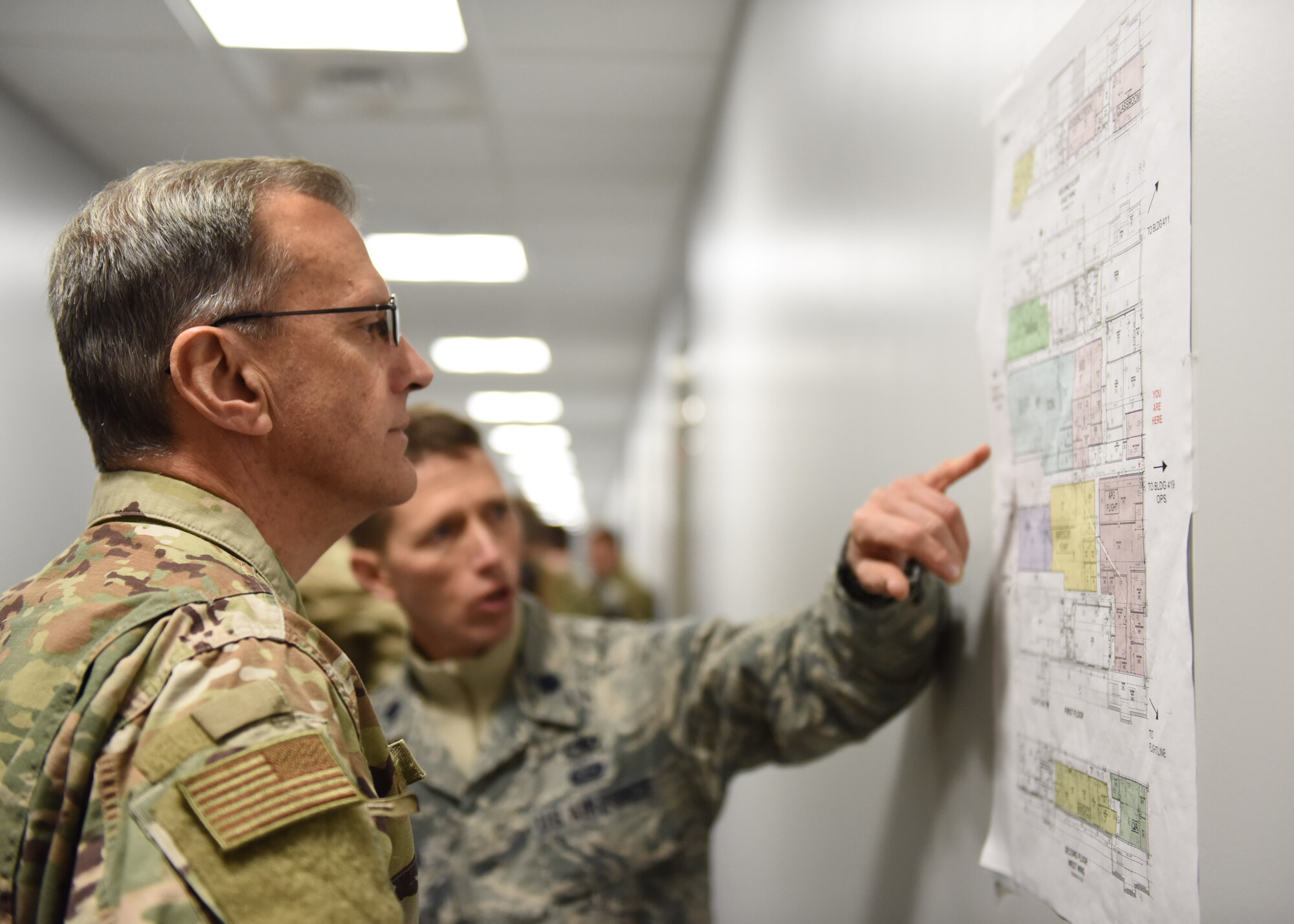 Lt. Col. William Chapman, deputy commander of the 911th Maintenance Group, shows Maj. Gen. Randall A. Ogden, 4th Air Force commander, a map of a new building at the Pittsburgh International Airport Air Reserve Station, Pennsylvania, Nov. 3, 2019.