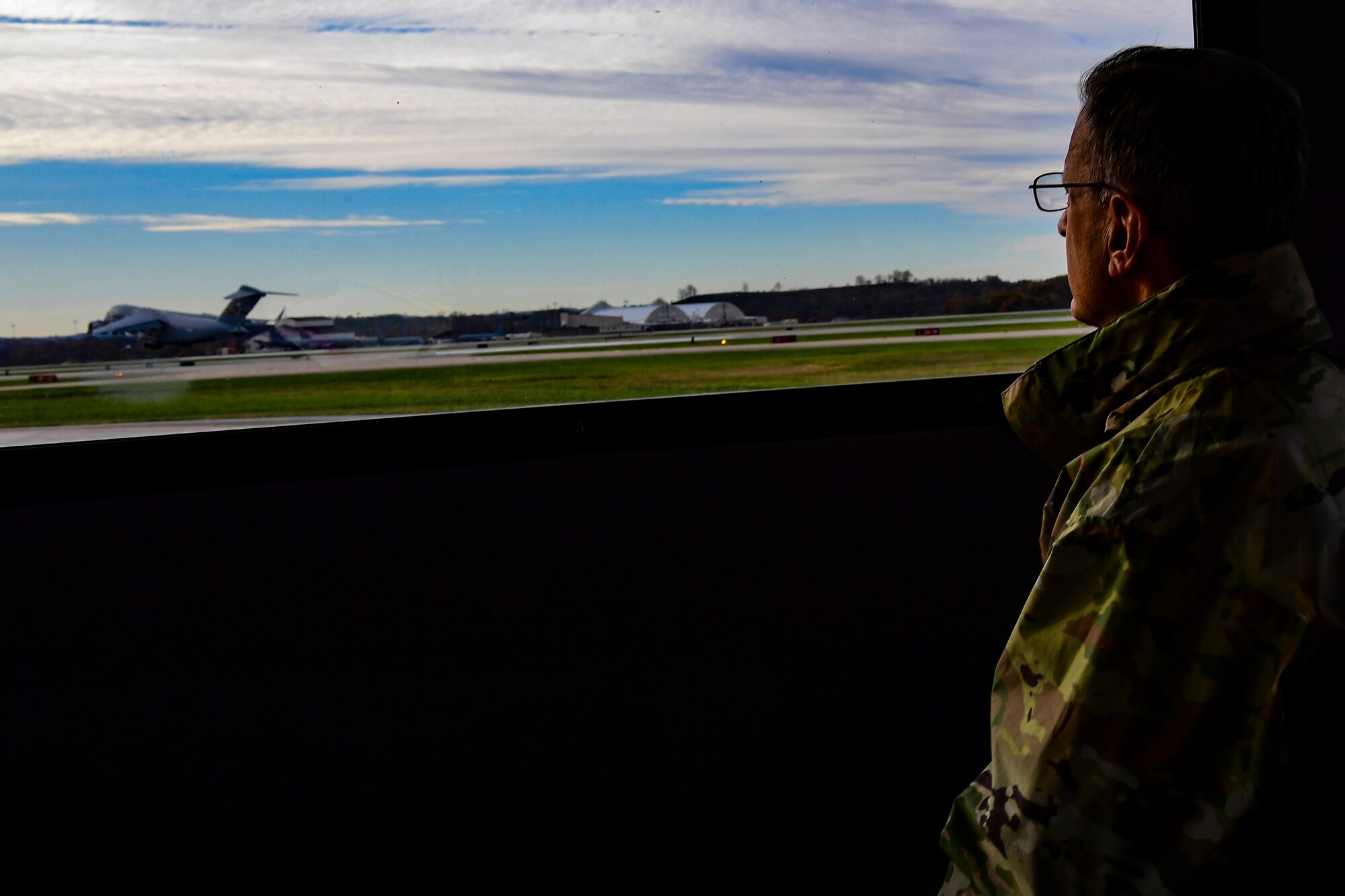 Maj. Gen. Randall A. Ogden, 4th Air Force commander, watches a C-17 Globemaster III depart from Pittsburgh International Airport Air Reserve Station, Pennsylvania, Nov. 4, 2019.