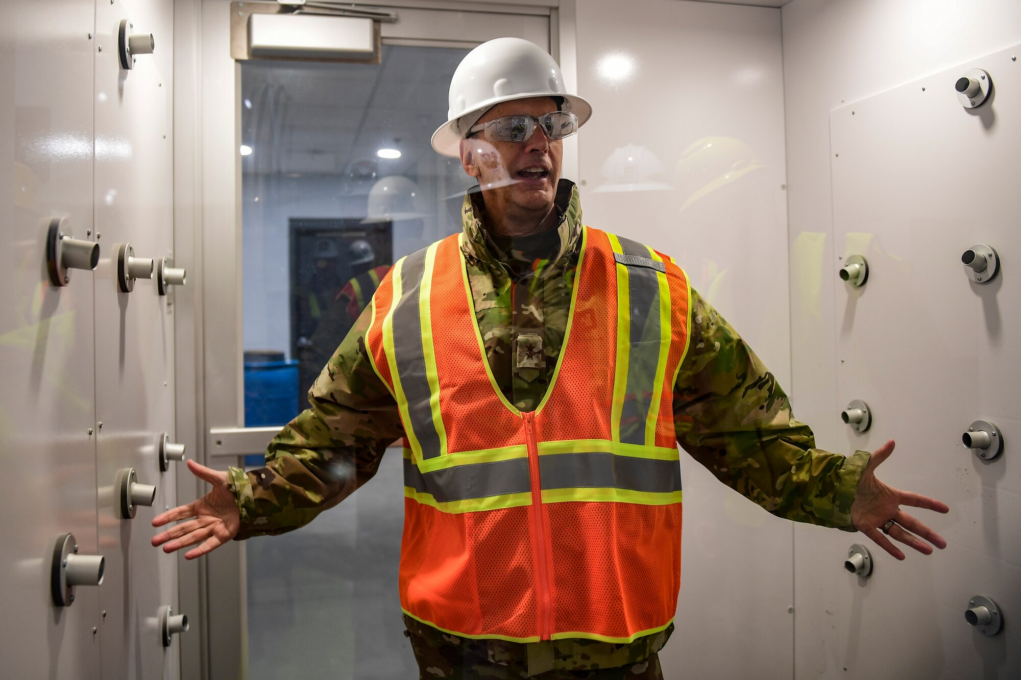 Maj. Gen. Randall A. Ogden, commander of the 4th Air Force, tests out the air bath station in the new hangar at the Pittsburgh International Airport Air Reserve Station, Pennsylvania, Nov 4, 2019.