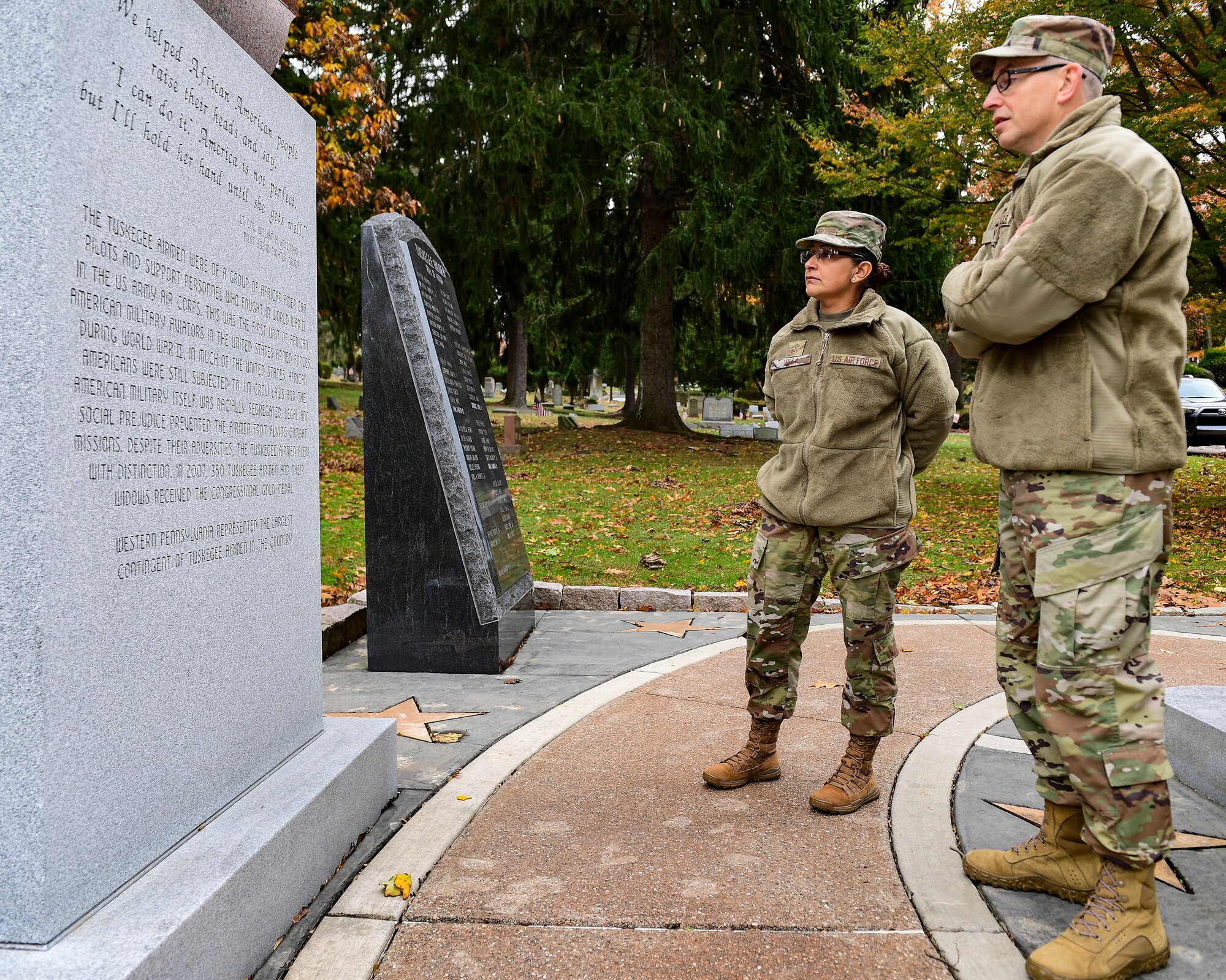 Chief Master Sgt. Cynthia Villa, command chief of the 4th Air Force, and Chief Master Sgt. Christopher D. Neitzel, command chief of the 911th Airlift Wing view the Tuskegee Airmen Memorial in Sewickley, Pennsylvania, Nov 1, 2019.