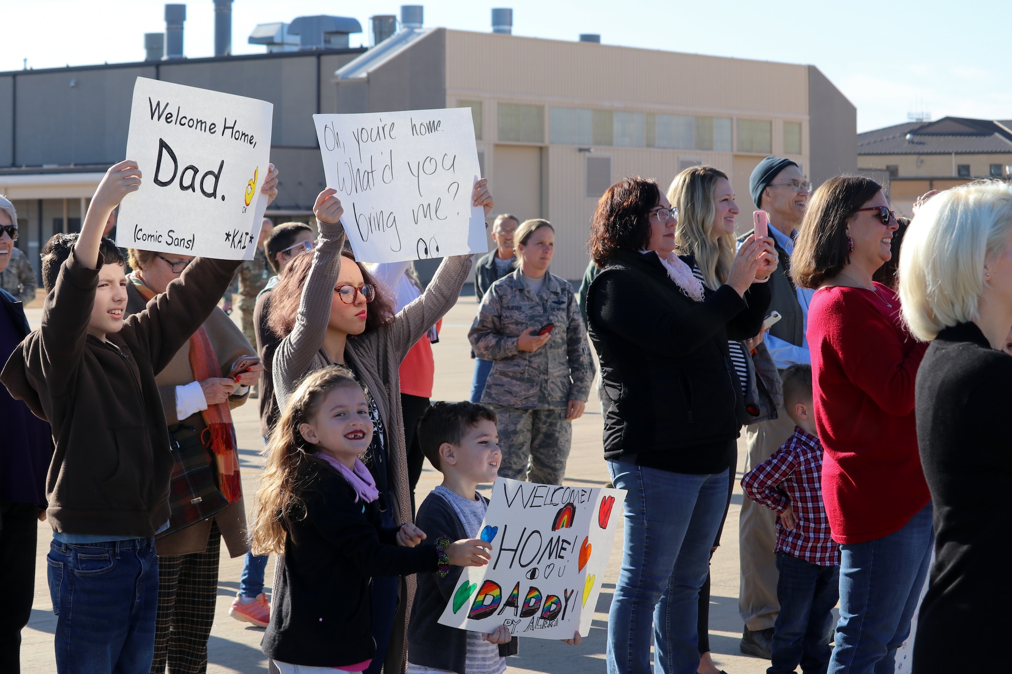 507th Air Refueling Wing families await the return of their deployed Airmen Nov. 25, 2019, at Tinker Air Force Base, Oklahoma. (U.S. Air Force photo by Senior Airman Mary Begy)