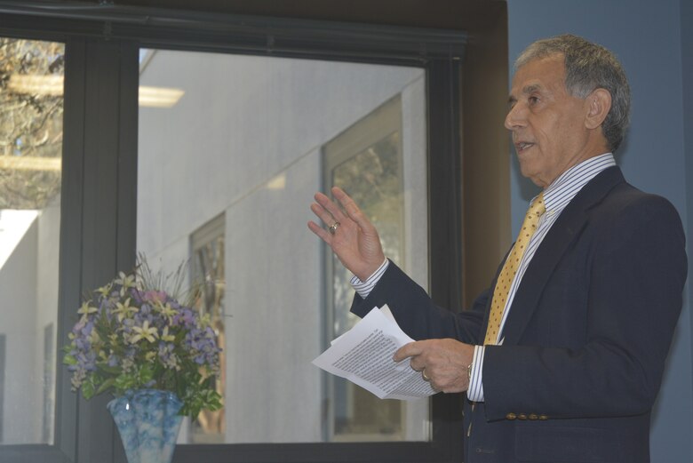 Dr. Zeki Demirbilek, a research hydraulics engineer with the Coastal and Hydraulics Laboratory at the U.S. Army Engineer Research and Development Center, received a giant penny during his retirement ceremony held at the ERDC-Vicksburg main campus, Nov. 15, 2019. Demirbilek is known for handing out pennies to co-workers for accomplishing good works. (U.S. Army photo by Carol C. Coleman)