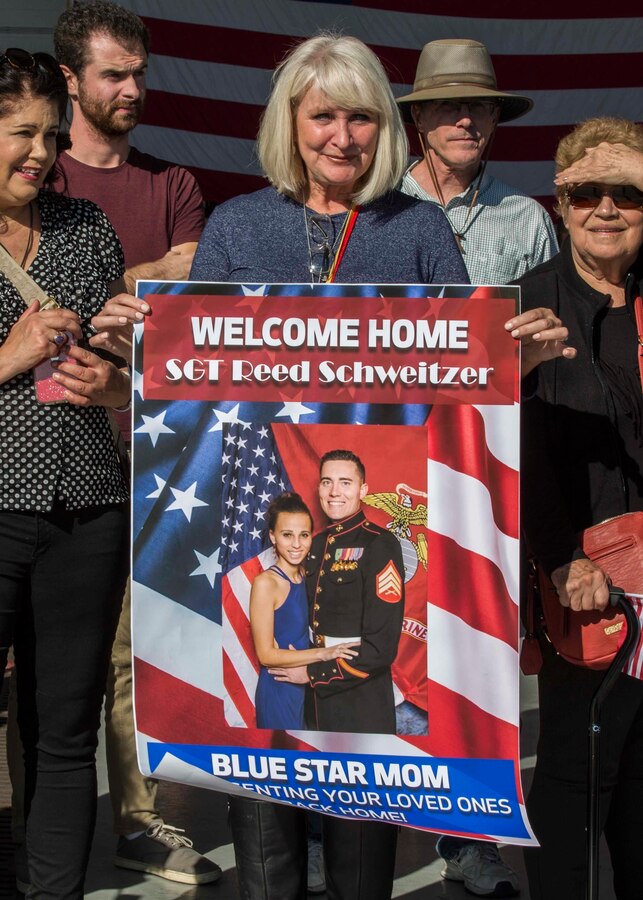Families and friends of Marines with Marine Medium Tiltrotor Squadron (VMM) 163, Marine Aircraft Group 16, 3rd Marine Aircraft Wing (MAW), await their loved ones at Marine Corps Air Station Miramar, Calif., Nov. 25, 2019. VMM-163 supported the 11th Marine Expeditionary Unit during routine operations as part of the Boxer Amphibious Ready Group in the Eastern Pacific Ocean. (U.S. Marine Corps photo by Lance Cpl. Jaime Reyes)