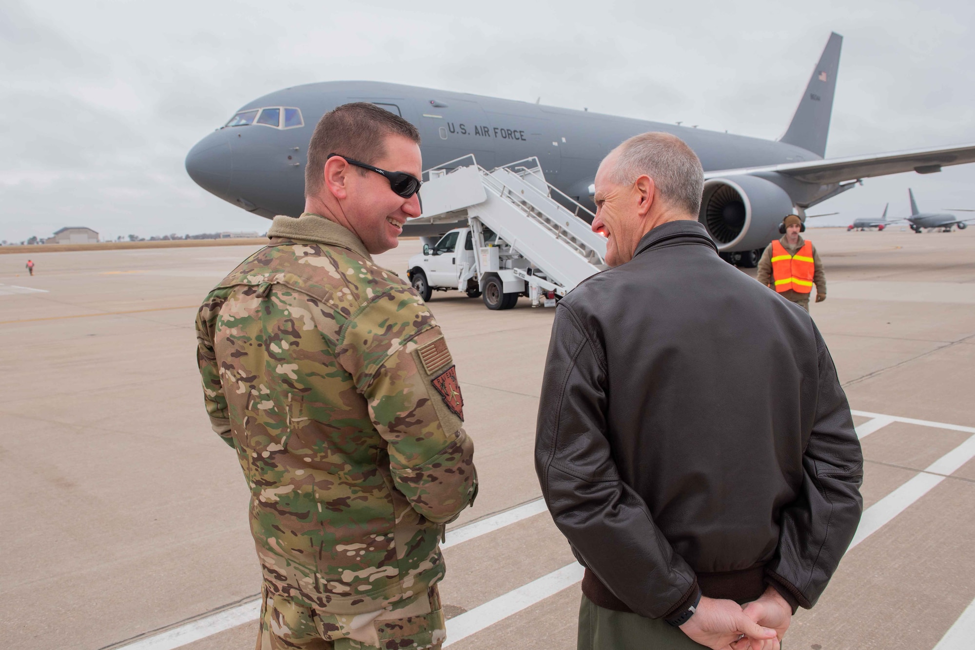 Col. Mark Baran, left, 22nd Air Refueling Wing vice commander, talks with Col. Eric Vitosh, 931st ARW vice commander, while waiting to welcome the aircrew who delivered McConnell’s 17th KC-46 Pegasus Nov. 22, 2019, at McConnell Air Force Base, Kan. McConnell has 19 KC-46s, the Air Force’s newest aircraft, which is the future of aerial refueling. (U.S. Air Force photo by Staff Sgt. Chris Thornbury)