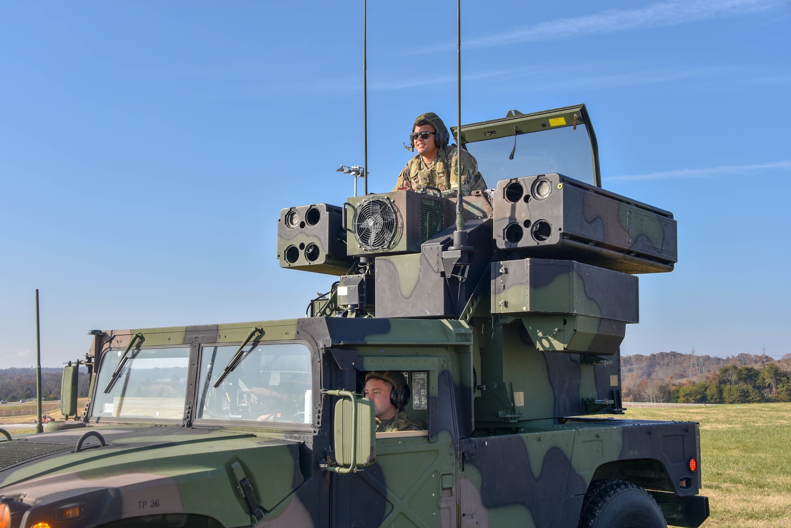 GT Scott Bailey, Team Chief, and SPC Reinole Gonzalez, a gunner with the 263rd Army Air and Missile Defense Command, watch for takeoff during Amalgam Dart 20-4 live-fly training exercise at McGhee Tyson Air National Guard Base, Tenn., Nov. 20, 2019.