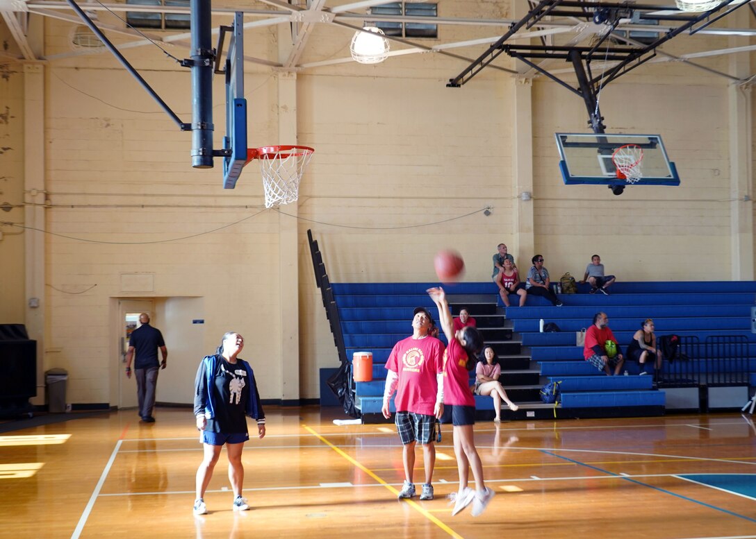 Special Olympics athletes play basketball on Joint Base Pearl Harbor-Hickam, Hawaii, Nov. 23, 2019. The Special Olympics has served more than 4,700 athletes on the islands of Hawaii. (U.S. Air Force photo by Airman 1st Class Erin Baxter)