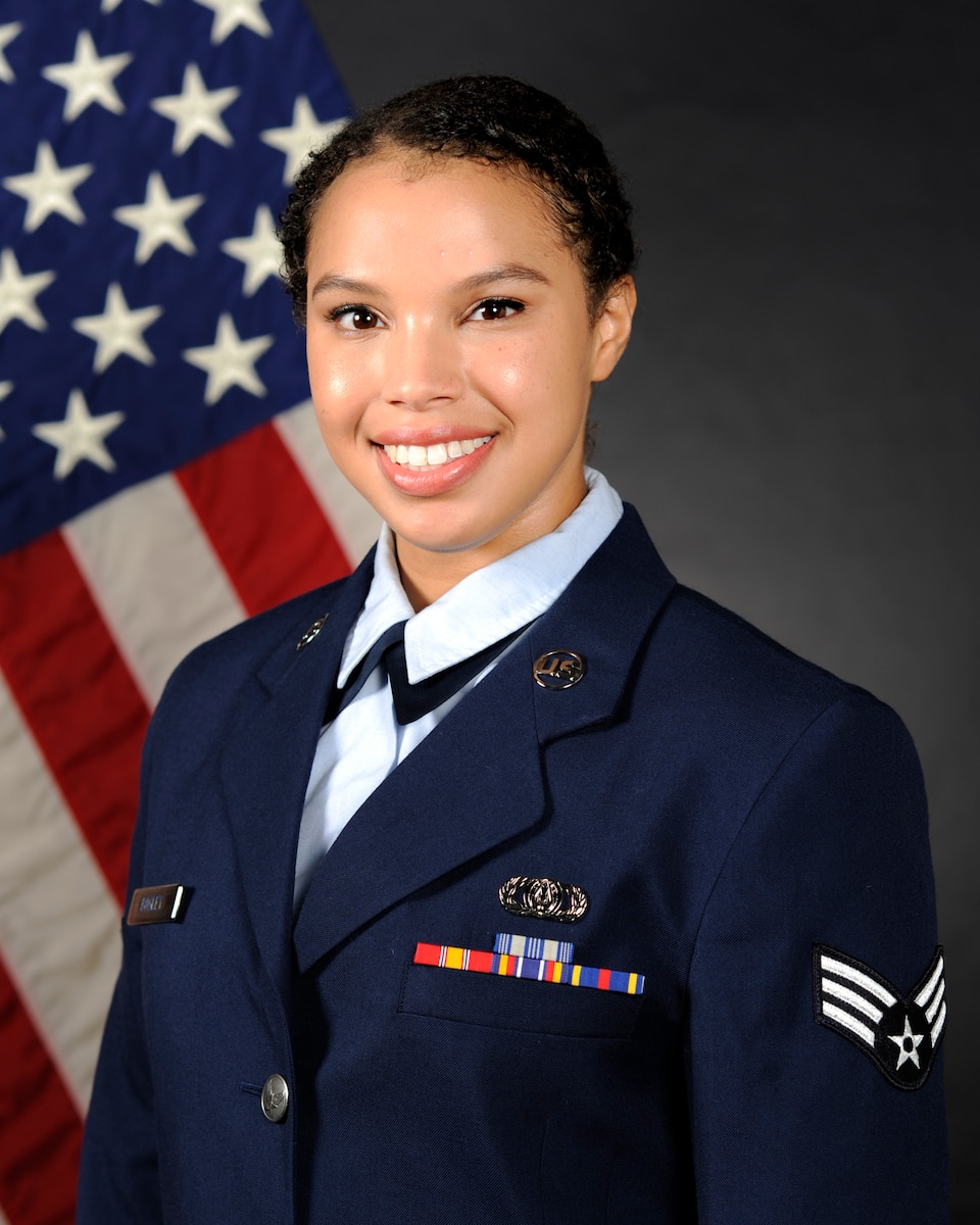 Official photo of SrA Christina Bagley, vocalist with Pacific Showcase and Final Approach at the United States Air Force Band of the Pacific, Yokota Air Base, Japan.