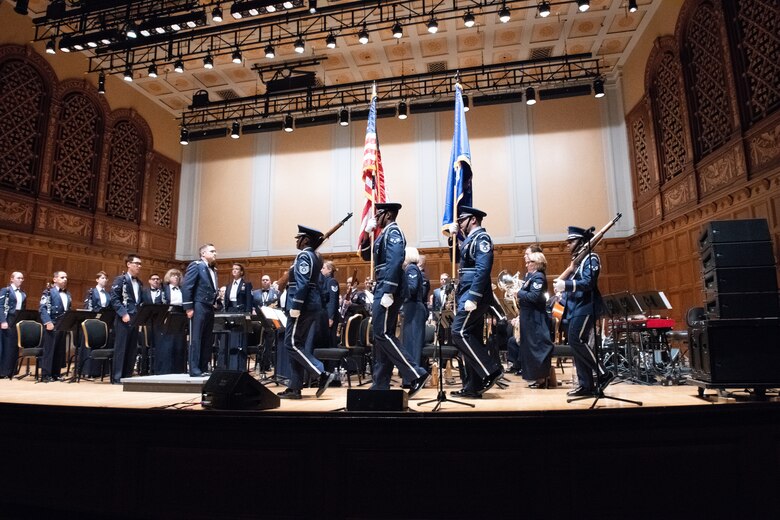 The 910th Airlift Wing base color guard presents the colors during a U.S. Air Force Heritage of America Band concert at Stambaugh Auditorium in Youngstown, Ohio, Nov. 18, 2019.