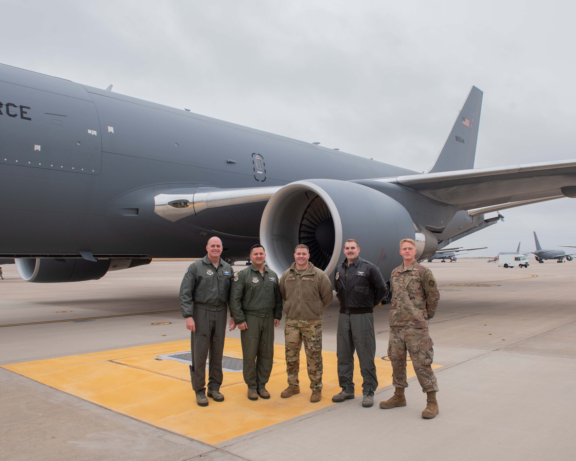 Brig. Gen. Darren V. James, left, Air Mobility Command KC-46 Pegasus Enterprise Lead, poses for a photo with the aircrew that delivered McConnell’s 17th KC-46 Nov. 22, 2019, at McConnell Air Force Base, Kan. McConnell has 19 KC-46s, the Air Force’s newest aircraft, which is the future of aerial refueling. (U.S. Air Force photo by Staff Sgt. Chris Thornbury)
