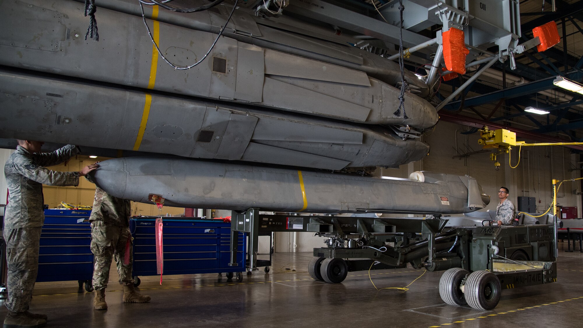 Airmen from the 2nd Munitions Squadron transport the final Conventional Air-launched Cruise Missile (CALCM) to be demilitarized at Barksdale Air Force Base, La., Nov. 20, 2019. The CALCM missile package was first operationally used in 1991 during Operation Secret Squirrel. (U.S. Air Force photo by Airman 1st Class Jacob B. Wrightsman)