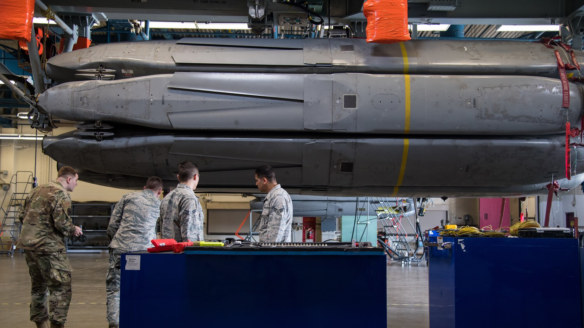 Airmen from the 2nd Munitions Squadron prepare to download the final Conventional Air-Launched Cruise Missile (CALCM) at Barksdale Air Force Base, La., Nov. 20, 2019. The 2nd MUNS loaded the final CALCM missile package into a launcher in order to disassemble the weapon to become demilitarized. (U.S. Air Force photo by Airman 1st Class Jacob B. Wrightsman)