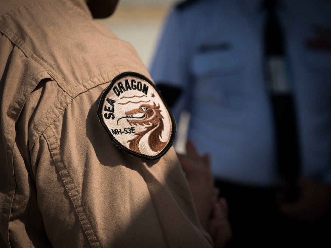 Spectators tour a U.S. Navy MH-53E Sea Dragon at the Dubai Airshow, United Arab Emirates, Nov. 18, 2019.