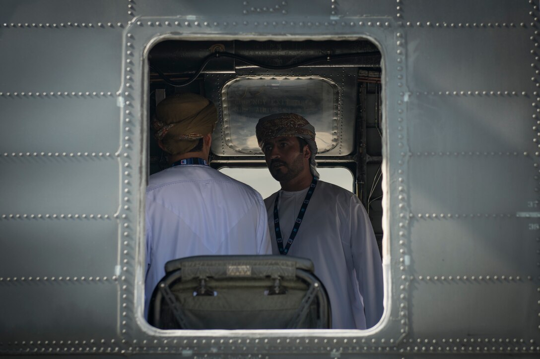 Spectators tour a U.S. Navy MH-53E Sea Dragon at the Dubai Airshow, United Arab Emirates, Nov. 18, 2019.
