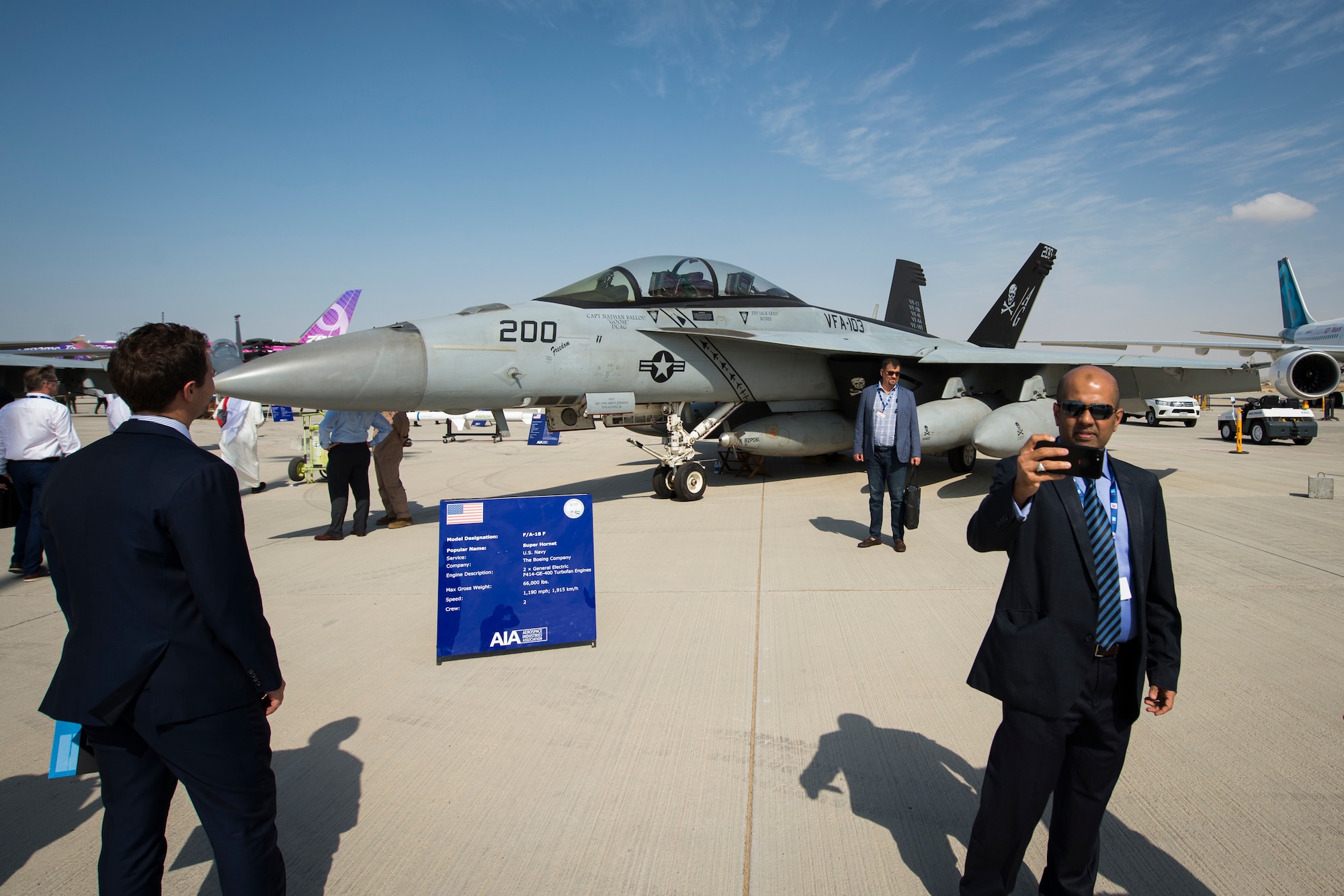 A spectator photographs a U.S. Navy F/A-18E Super Hornet at the Dubai Airshow, United Arab Emirates, Nov. 18, 2019.