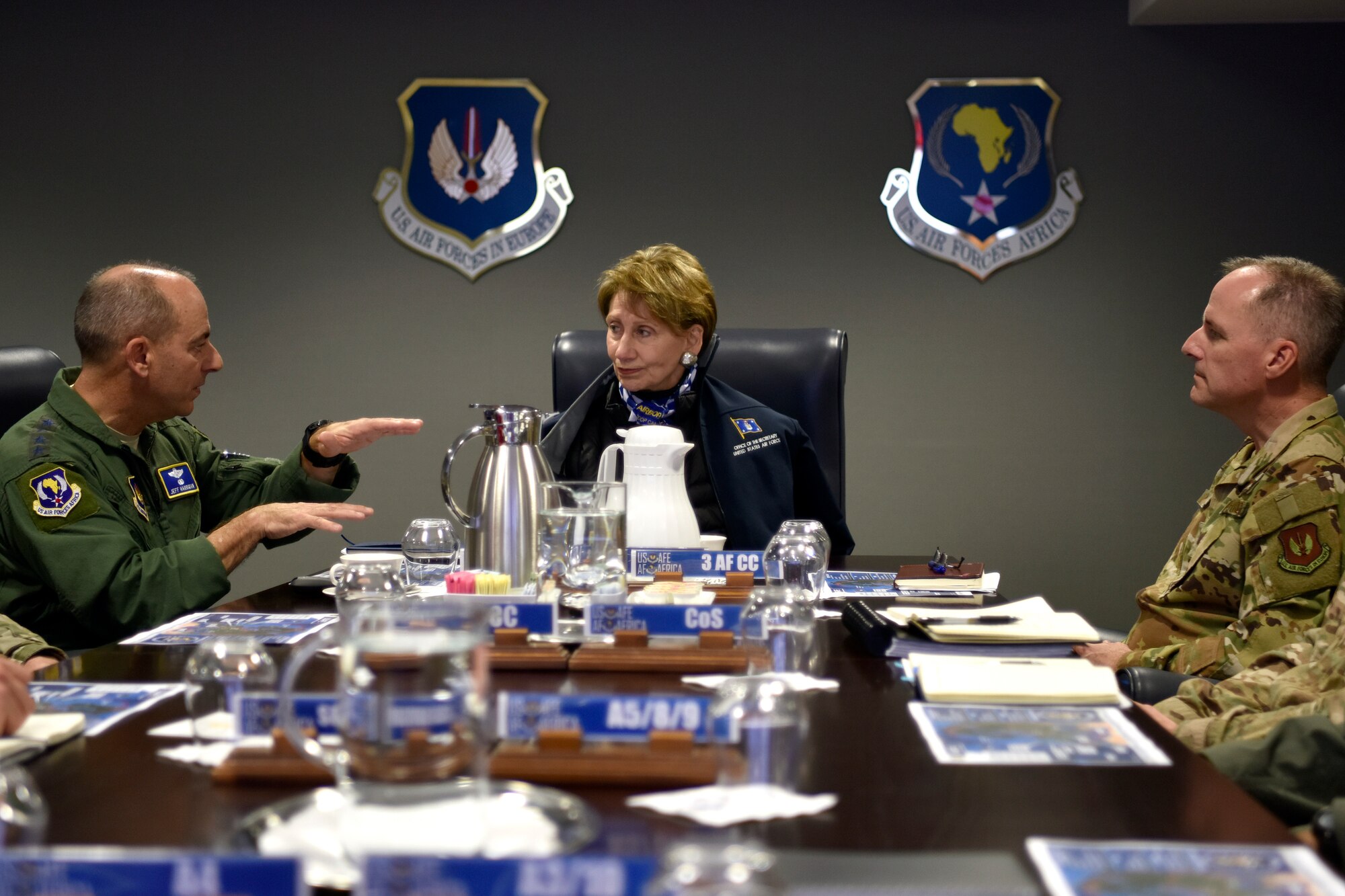 Gen. Jeff Harrigian, U.S. Air Forces in Europe and Air Forces Africa commander, briefs Secretary of the Air Force Barbara M. Barrett with Maj. Gen. John Wood, Third Air Force Commander, during a command overview brief at Ramstein Air Base, Germany, Nov. 22, 2019.