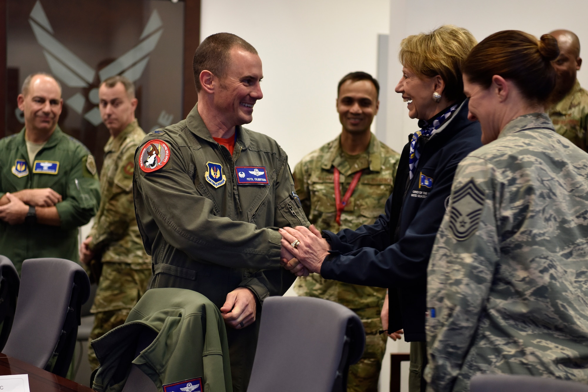 U.S. Air Force Col. Cary Culbertson, 603rd Air and Space Operations Center commander, greets Secretary of the Air Force Barbara M. Barrett, during a tour of the AOC at Ramstein Air Base, Germany, Nov. 22, 2019.
