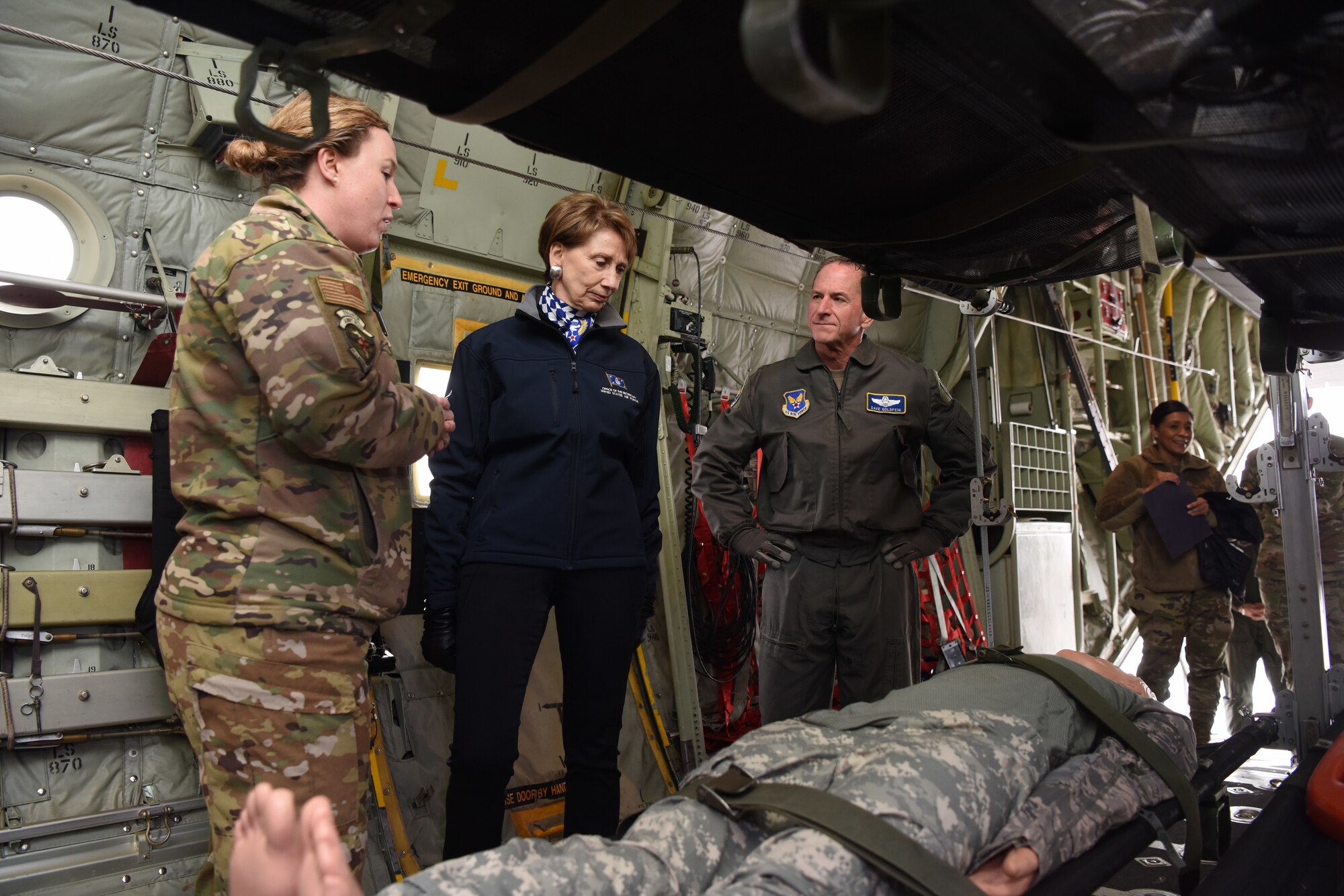 Secretary of the Air Force Barbara Barrett and Air Force Chief of Staff Gen. David L. Goldfein visit with members of the 86th Aeromedical Evacuation Squadron on a U.S. Air Force C-130J Super Hercules aircraft during a visit to Ramstein Air Base, Germany, Nov. 22, 2019.