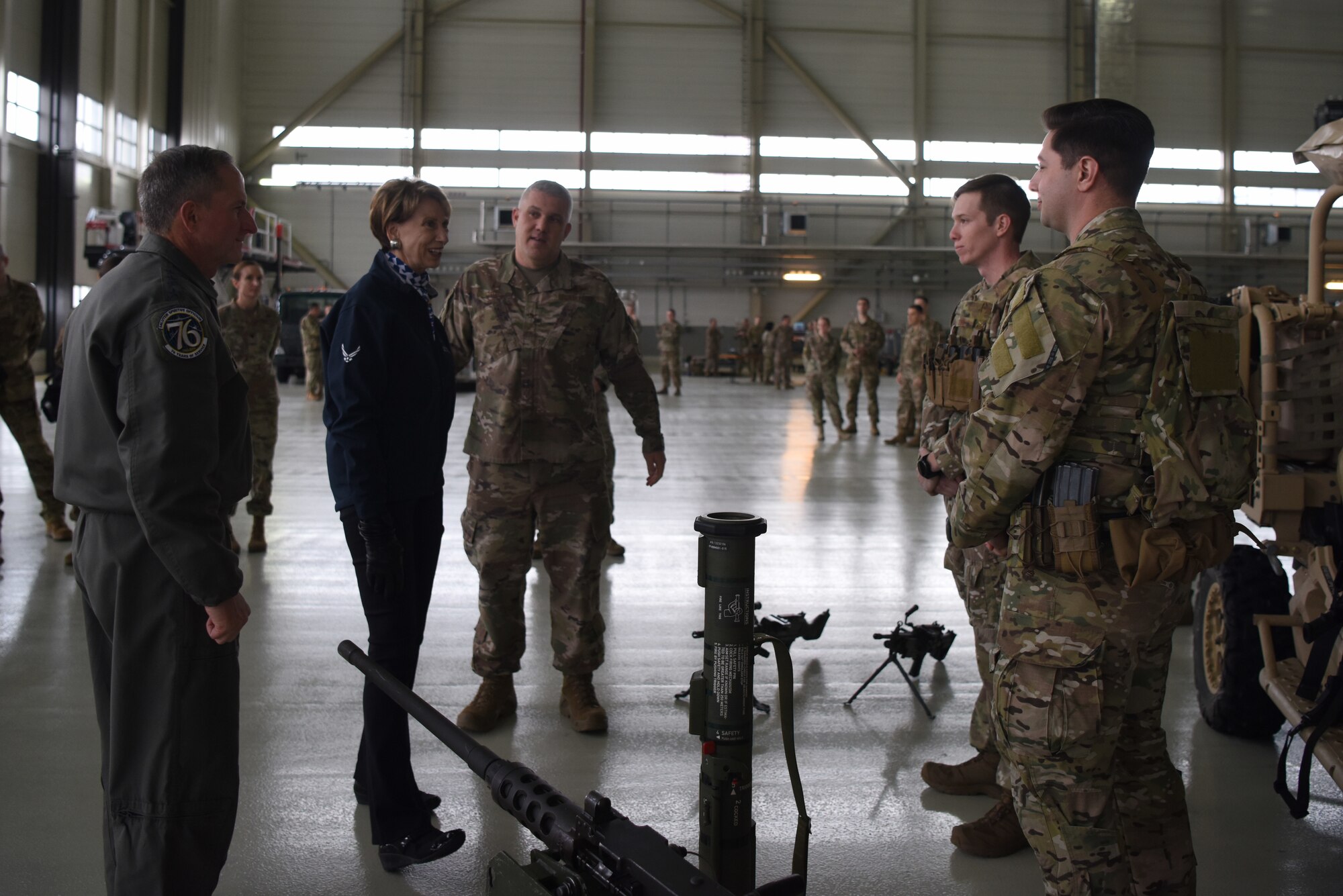Air Force Chief of Staff Gen. David L. Goldfein and Secretary of the Air Force Barbara Barrett talk to members of the 435th Security Forces Squadron during a base tour on Ramstein Air Base, Germany, Nov. 22. 2019.