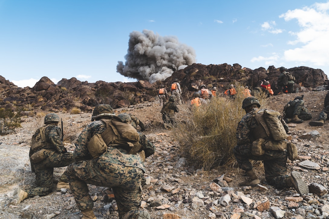 U.S. Marines with 2nd Battalion, 4th Marine Regiment, 1st Marine Division, detonate obstacle-breaching Bangalore torpedoes during a live fire and maneuver exercise at the company assault course, Range 400, Marine Corps Air Ground Combat Center, Twentynine Palms, Calif., Nov. 20, 2019. 1st Marine Division took advantage of training opportunities at the Combat Center to further develop their proficiency while fully integrating combined arms systems of an infantry battalion.
