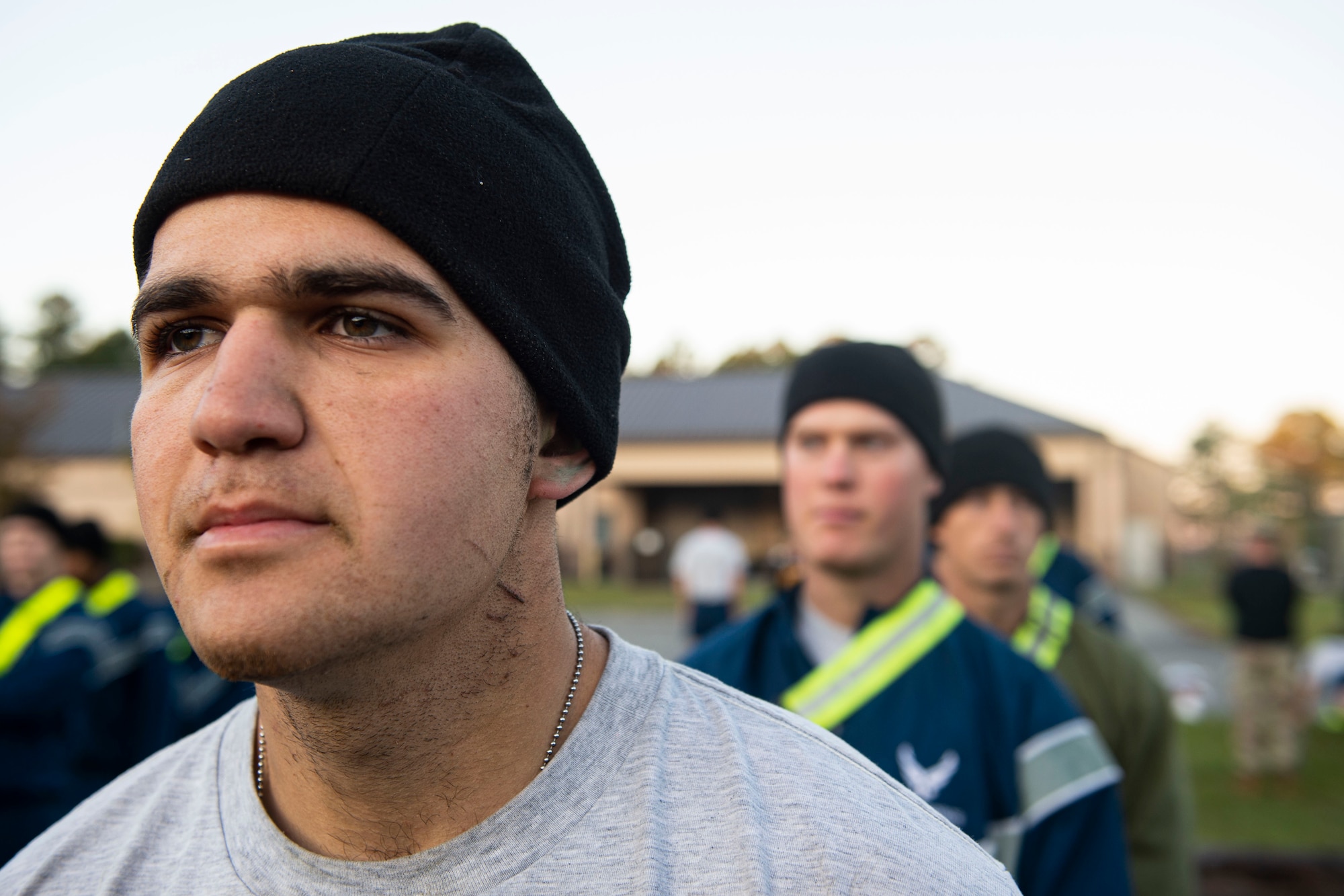 A photo of Air Force Ranger Assessment Course students standing in formation during a physical training test