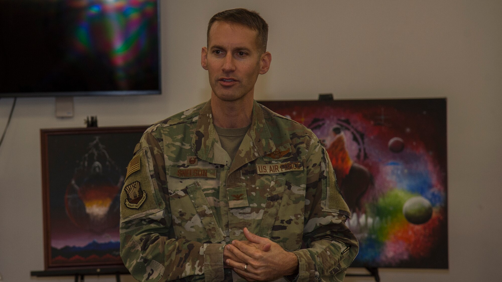 U.S. Air Force Col. Steve Snelson, the 6th Air Refueling Wing commander, provides opening remarks during a Native American Heritage Month Celebration, Nov. 21, 2019, at MacDill Air Force Base, Fla.  The event featured traditional dance, songs and art provided by members of the Cherokee, Kiowa and Navajo Nations.