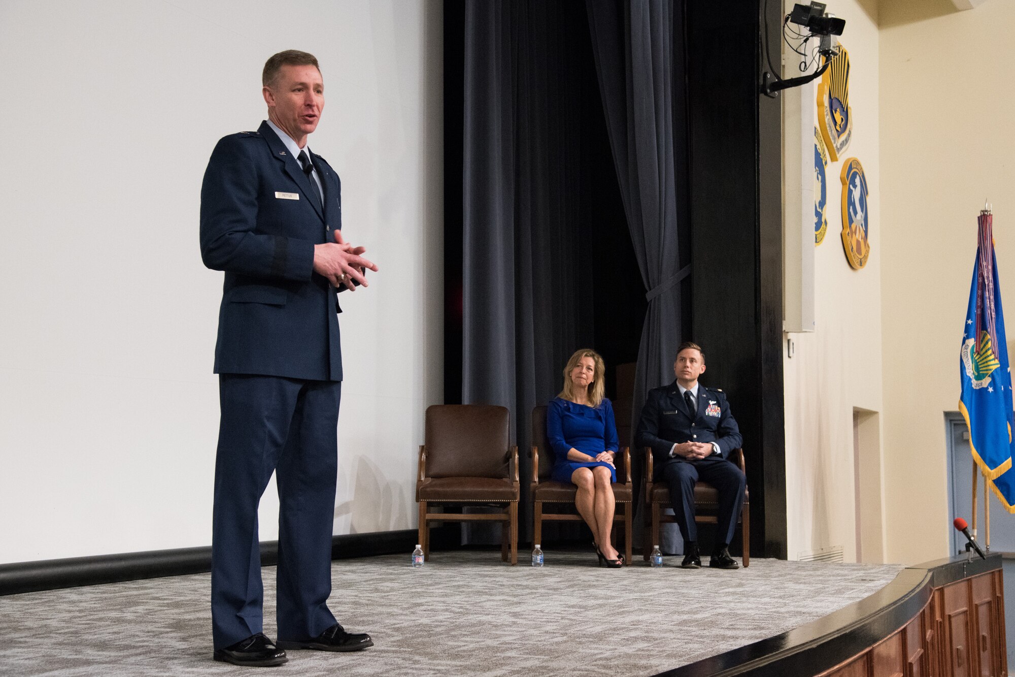 Major Jay Burrell Doerfler addressed the participants to his award ceremony at Maxwell AFB’s Wood Auditorium, November 18, 2019. Doerfler provided 125 hours of counseling for a local youth group made up of more than 50 teams, volunteered his time towards local charities and homeless shelters, thousands of meals were packed for and served for malnourished children of homelessness throughout the year, all while executing 5,700 sorties and more than 9,300 flying hours.
