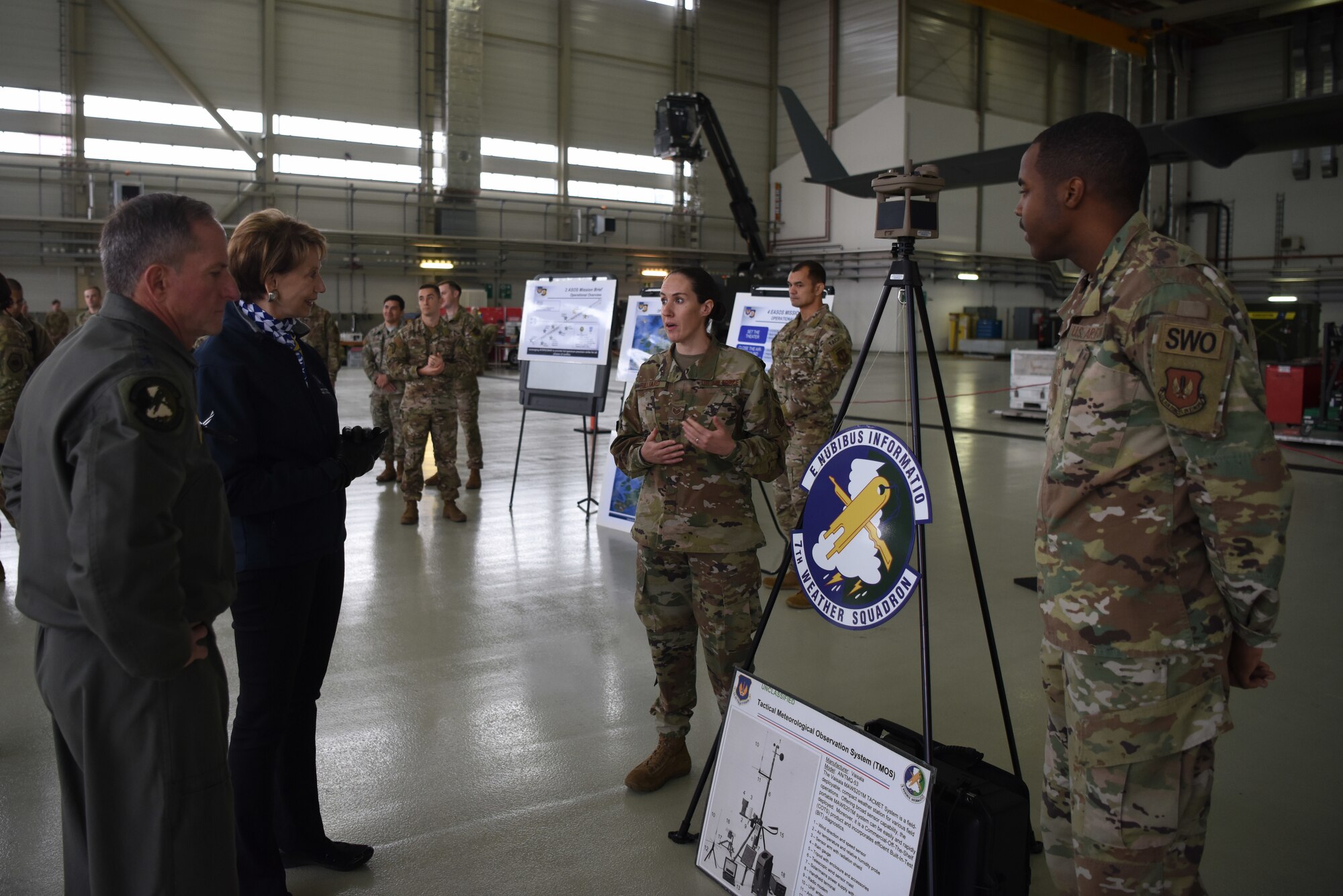 Members of the 7th Weather Squadron discuss micro weather systems employment with Air Force Chief of Staff Gen. David L. Goldfein and Secretary of the Air Force Barbara Barrett.