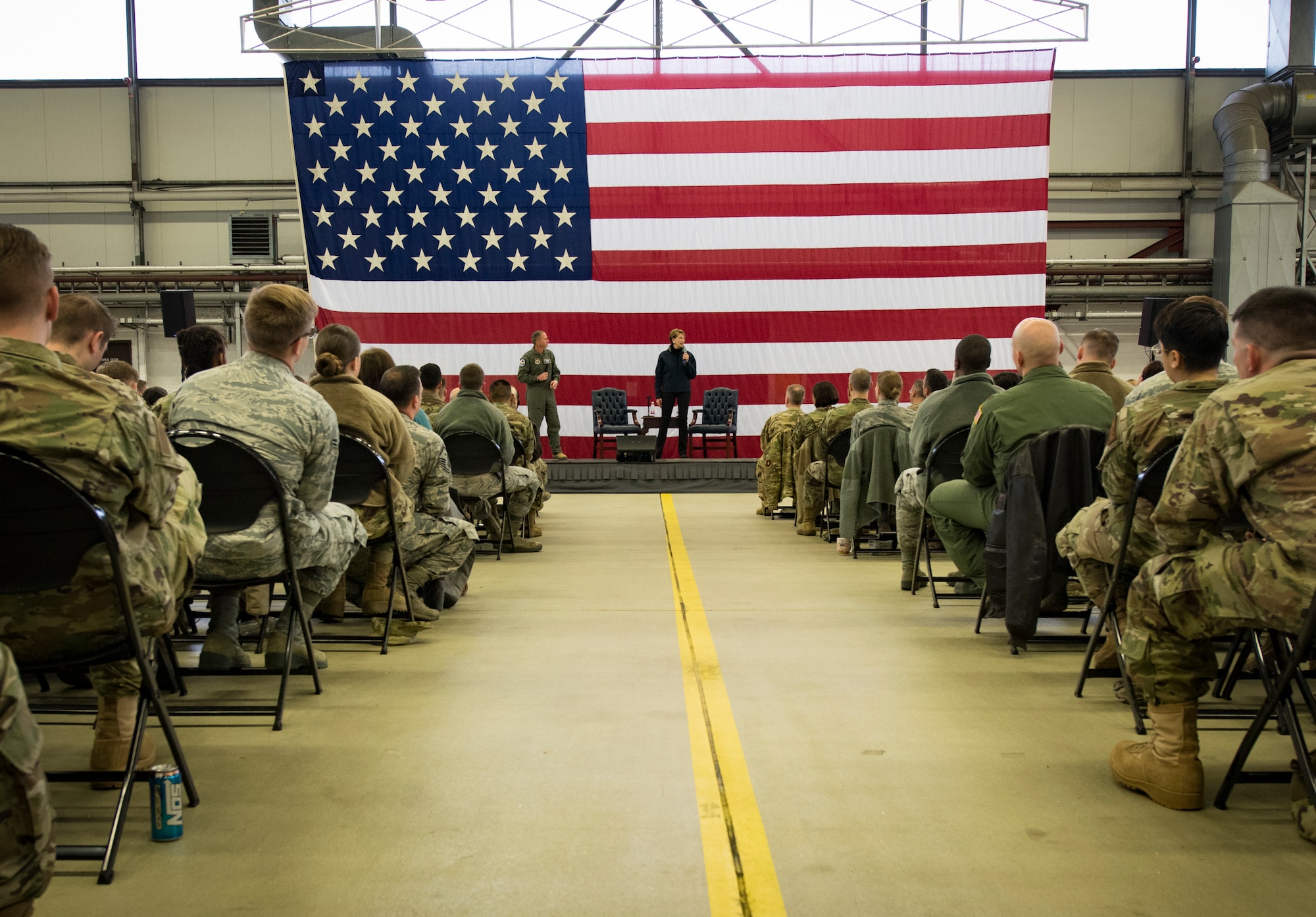 Secretary of the Air Force Barbara Barrett, right, and Air Force Chief of Staff Gen. David L. Goldfein answer questions from Airmen during a town hall on Ramstein Air Base, Germany, Nov. 22, 2019.