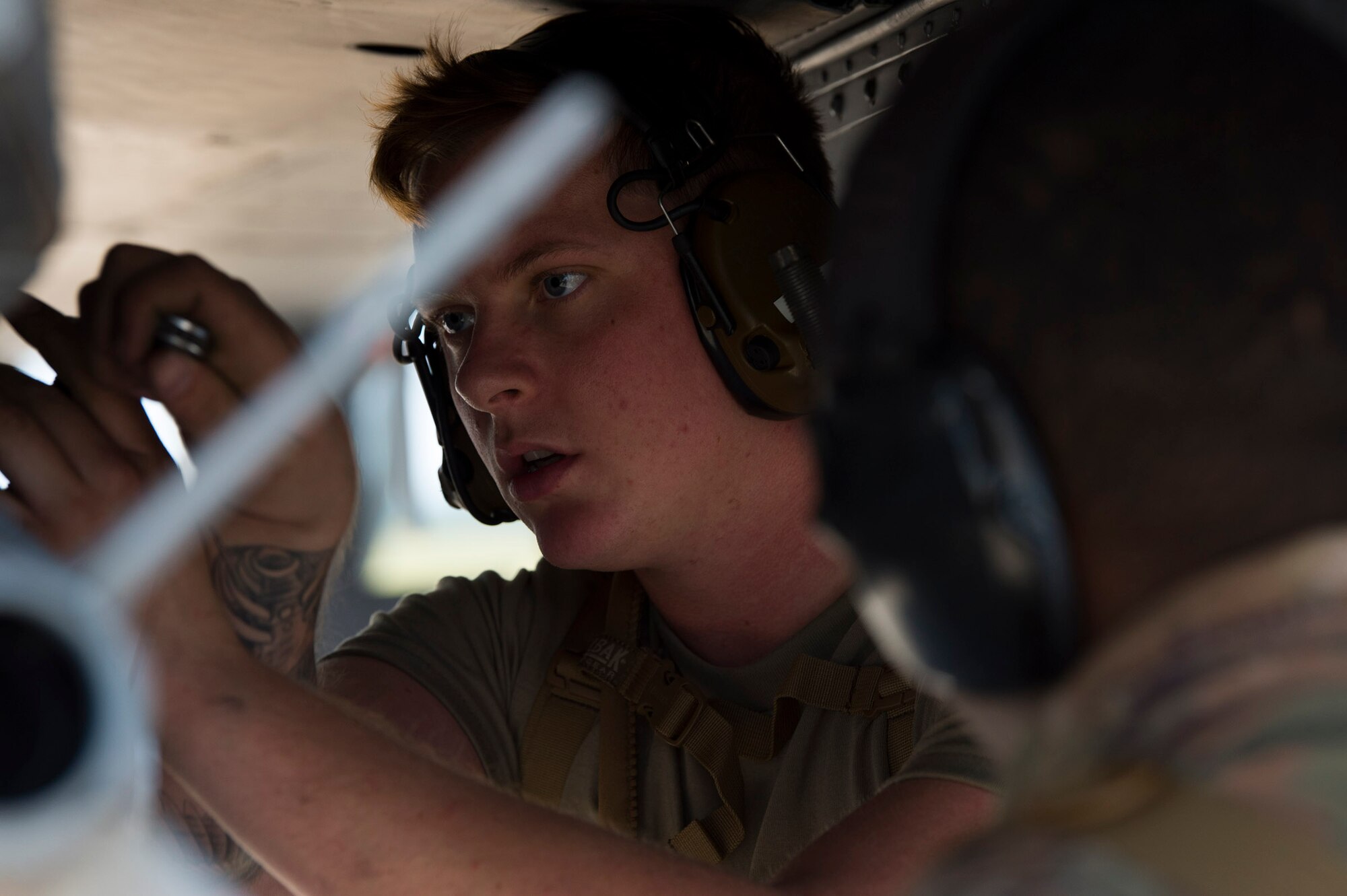U.S. Air Force Senior Airman Dylan Holton, a weapons load crewmember assigned to the 23rd Aircraft Maintenance Squadron, Moody Air Force Base, Ga., secures a weapon on an A-10 Thunderbolt II assigned to the 74th Fighter Squadron, Moody AFB, for Exercise Mobile Tiger Nov. 19, 2019 on MacDill Air Force Base, Fla.