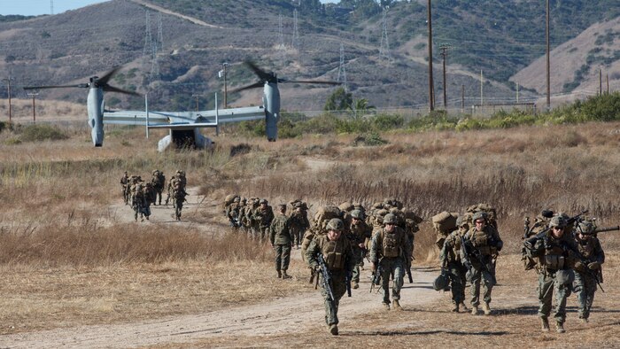 U.S. Marines with Kilo Company, Battalion Landing Team 3/5, 11th Marine Expeditionary Unit, depart from an MV-22 Osprey with Marine Medium Tiltrotor Squadron (VMM) 163 (Reinforced), 11th MEU, after returning to Marine Corps Base Camp Pendleton, California, from a seven-month deployment. The 11th MEU is returning home after being deployed aboard the Boxer Amphibious Ready Group, having completed operations and exercises in the U.S. Indo-Pacific Command and U.S. Central Command areas of responsibility.