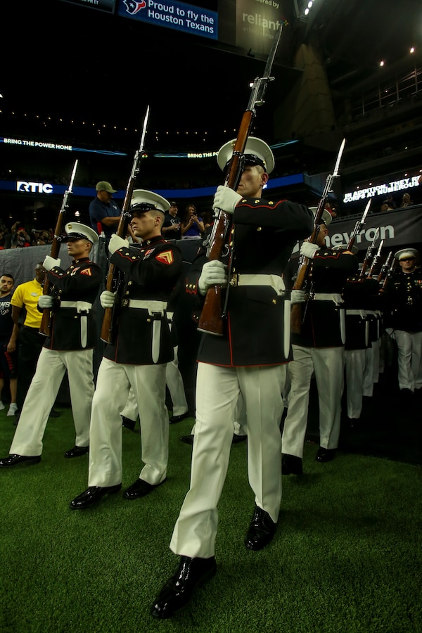 Marines with the U.S. Marine Corps Silent Drill Platoon perform at NRG Stadium, Houston, Texas, Nov. 21, 2019. The Silent Drill Platoon performed during the halftime show at the Houston Texans vs. Indianapolis Colts NFL game. (U.S. Marine Corps photo by Sgt. Robert Knapp)